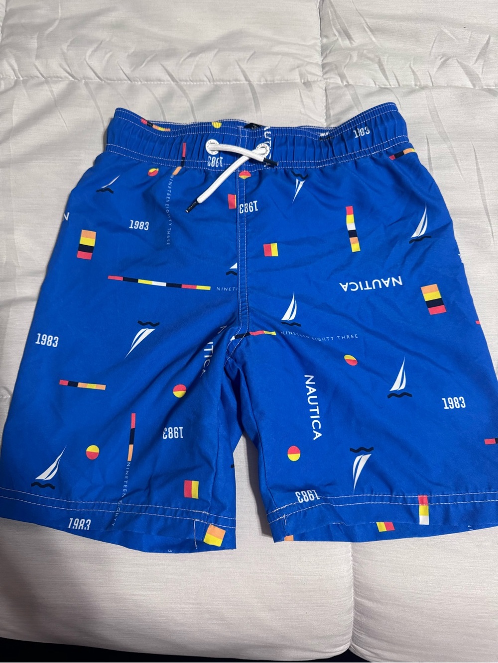 Nautica Blue Sailboat & Nautical Flag Swim Shorts
